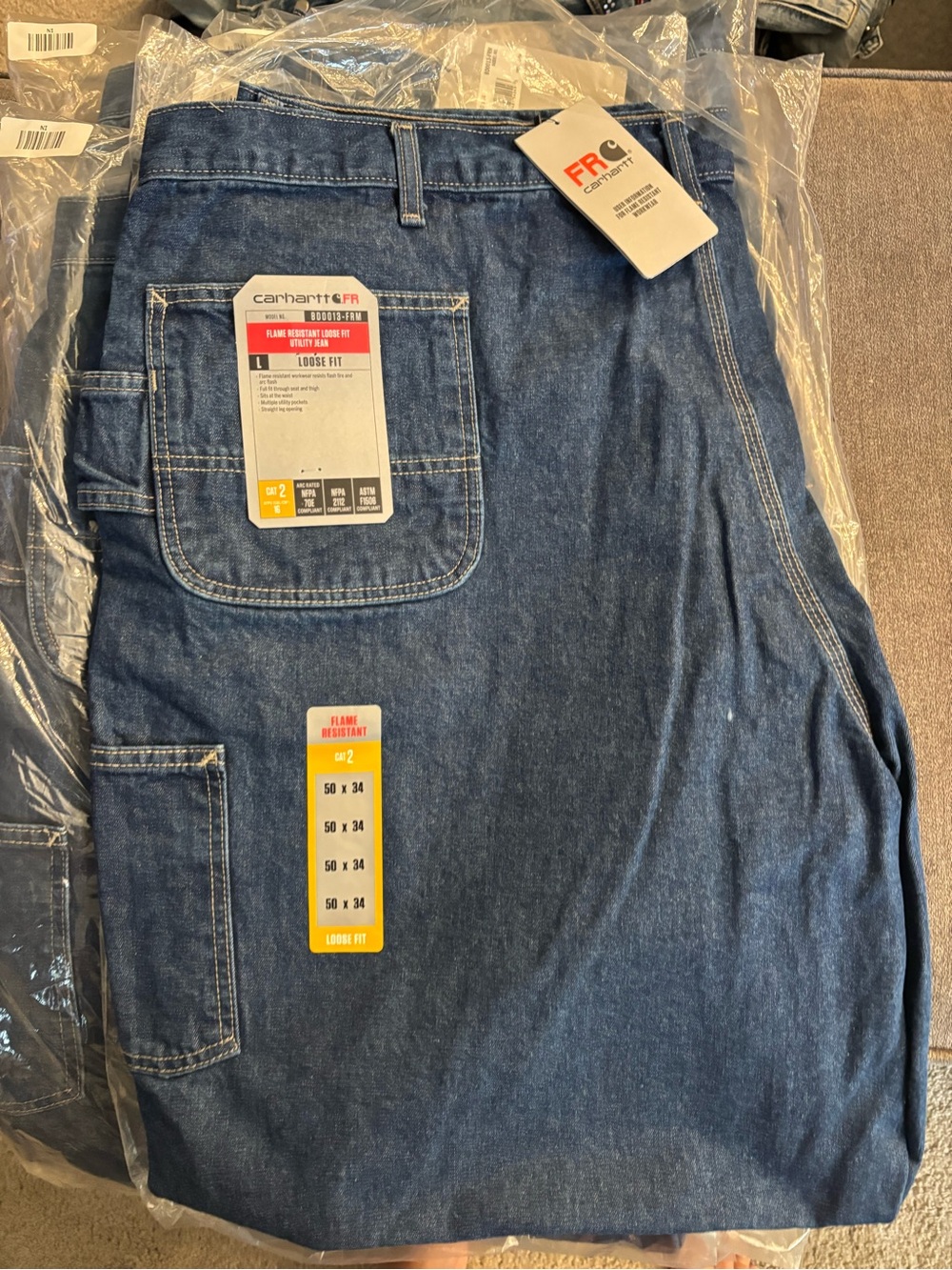 Carhartt Men's Relaxed Fit Work Jeans in Dark Blue Denim